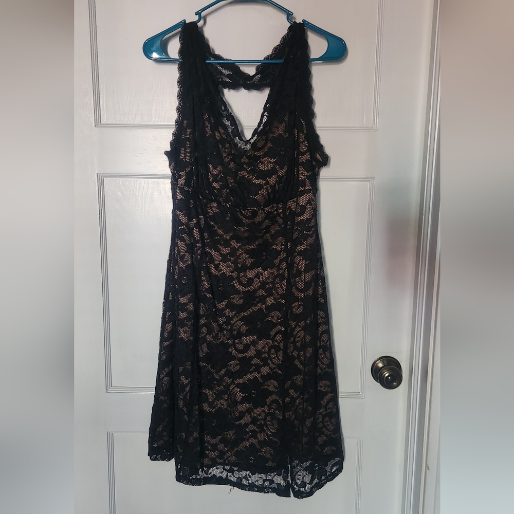 Black lace dress with tan underdress